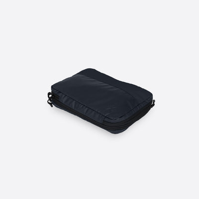 Nest-packing-cube-blueberry-navy-0b#farbe_blueberry-navy